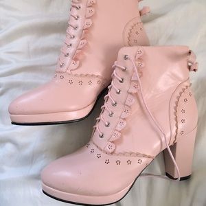 Pink high heel boots